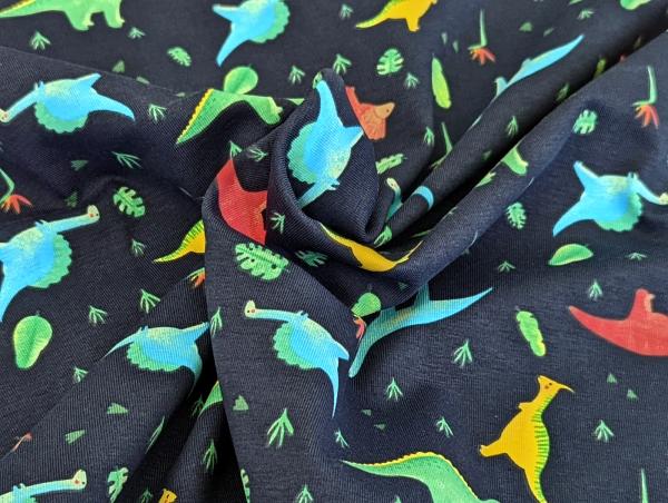 Baumwolljersey Kleine Neon Dinos auf Dunkelblau